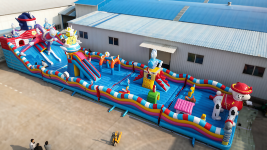 Custom Themed Inflatable Fun Park - Giant Blue Castle with Slides, Climbing & Cartoon Figures - Jinshun Amusement Equipment